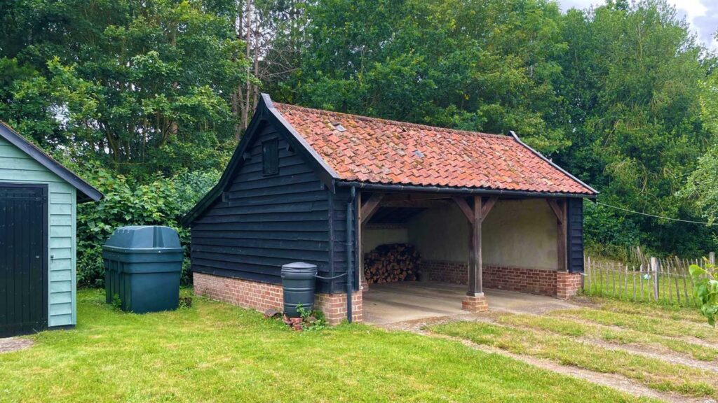 Detached cart shed style carport